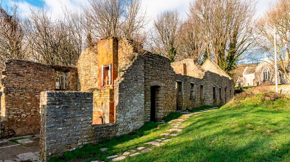 A crumbling old building in an English village